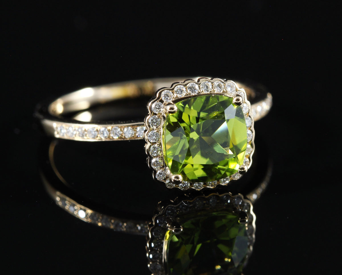 Bague or rose sertie d'un péridot